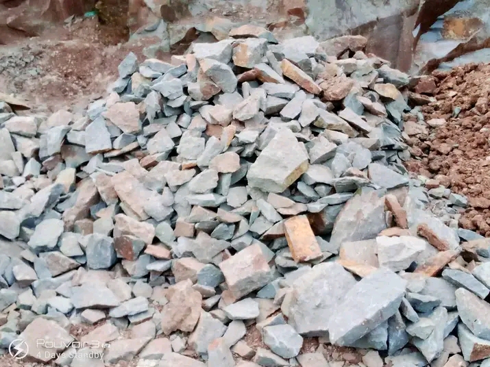 Hardcore stone piled at the quarry